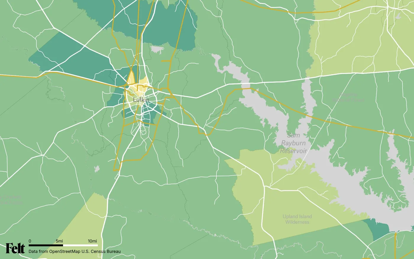 Map of Angelina County, Texas: the county outlined, with transmission lines over median household income by census tract