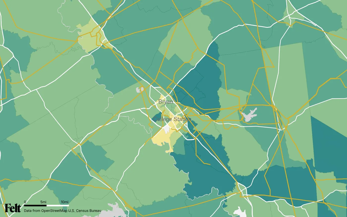 Map of Brazos County, Texas: the county outlined, with transmission lines over median household income by census tract