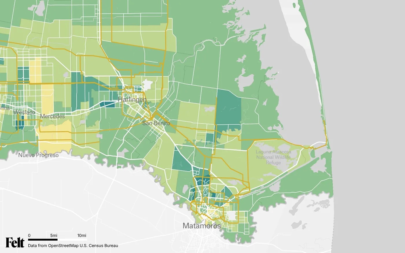 Map of Cameron County, Texas: the county outlined, with transmission lines over median household income by census tract