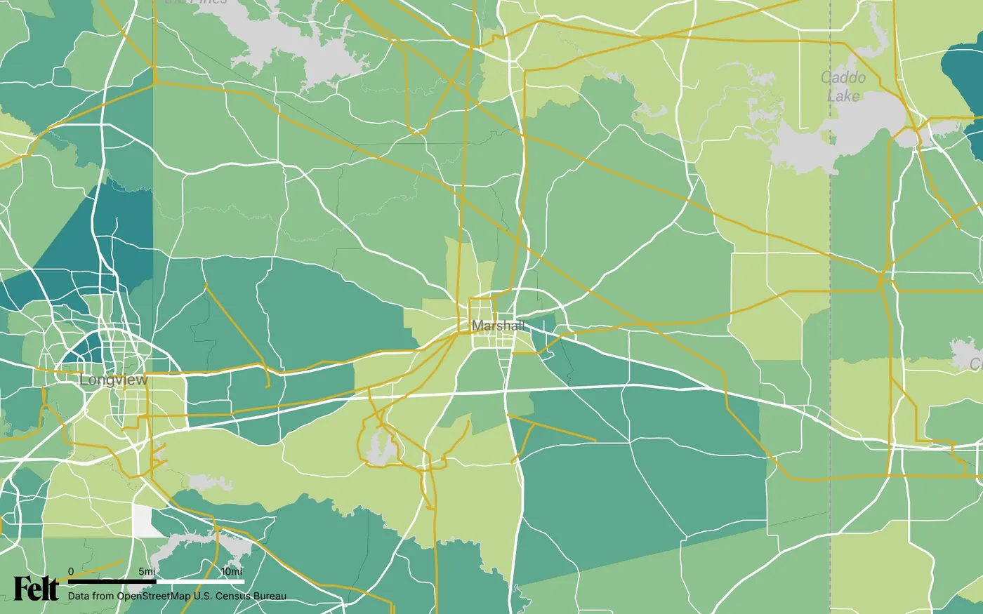 Map of Harrison County, Texas: the county outlined, with transmission lines over median household income by census tract