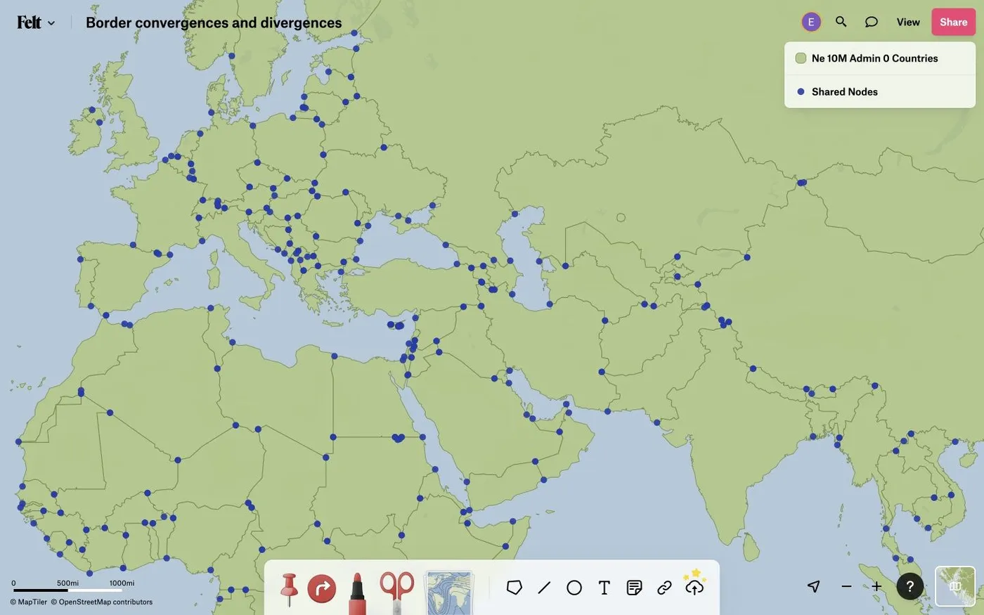 A Felt map of country borders across Europe, Africa and Asia with blue dots at nodes shared between borders