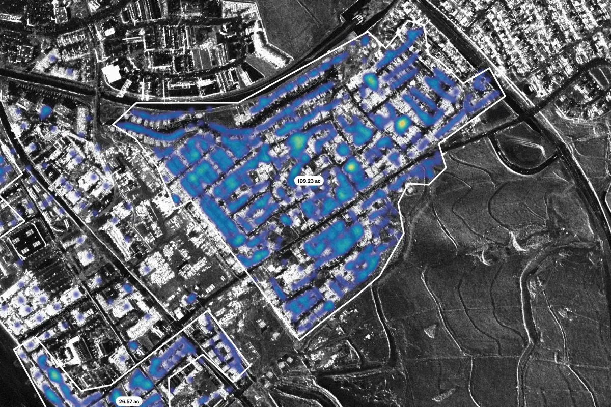 A closer view of the 109.23-acre outlined area on SAR satellite imagery, with damage intensity shown as a blue heat map
