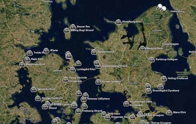 A Felt map on satellite imagery of Danish islands with rock icons marking known fossil sites