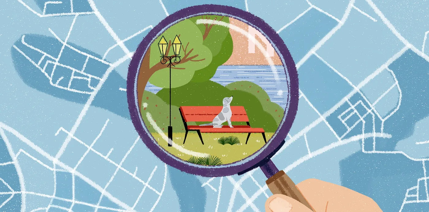 An illustration of a magnifying glass over a street map revealing a dog sitting on a park bench by the water