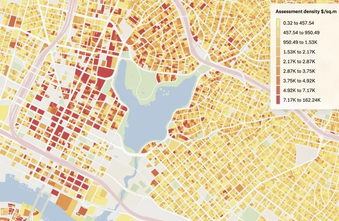 A Felt map of Oakland parcels around Lake Merritt shaded yellow to red by assessment density in dollars per square meter