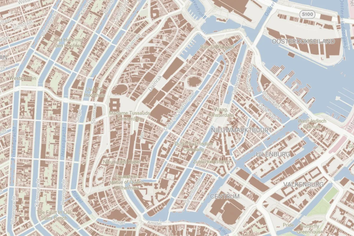 A Felt map of central Amsterdam with Overture building footprints filled in brown between the canals