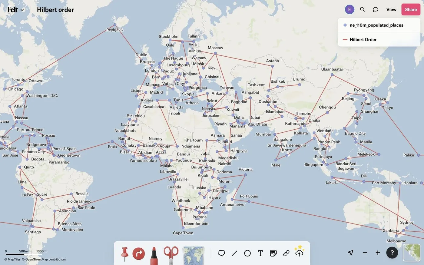 A Felt map of world capitals connected by a red line in Hilbert curve order