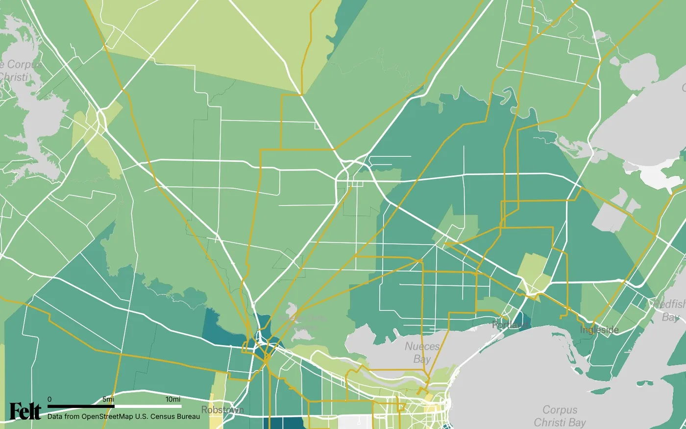 Map of San Patricio County, Texas: the county outlined, with transmission lines over median household income by census tract