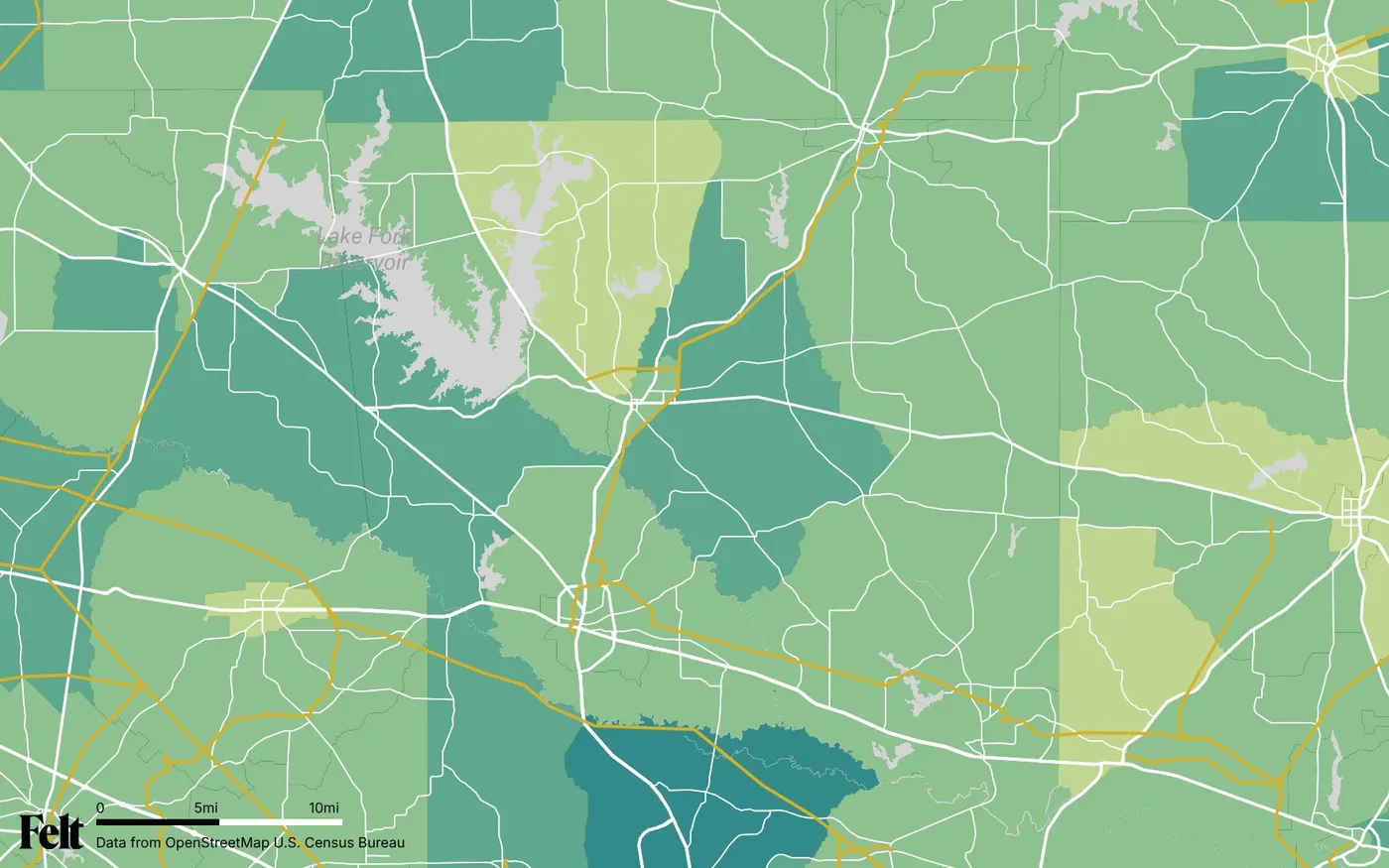 Map of Wood County, Texas: the county outlined, with transmission lines over median household income by census tract