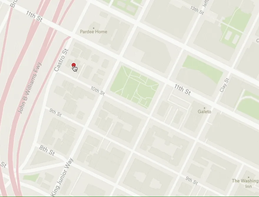 Scroll-zooming an Oakland street map keeps the point under the cursor fixed while the map zooms around it